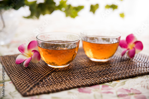 glasses of tea on wooden plate