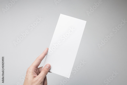 Hand holding DL Flyer