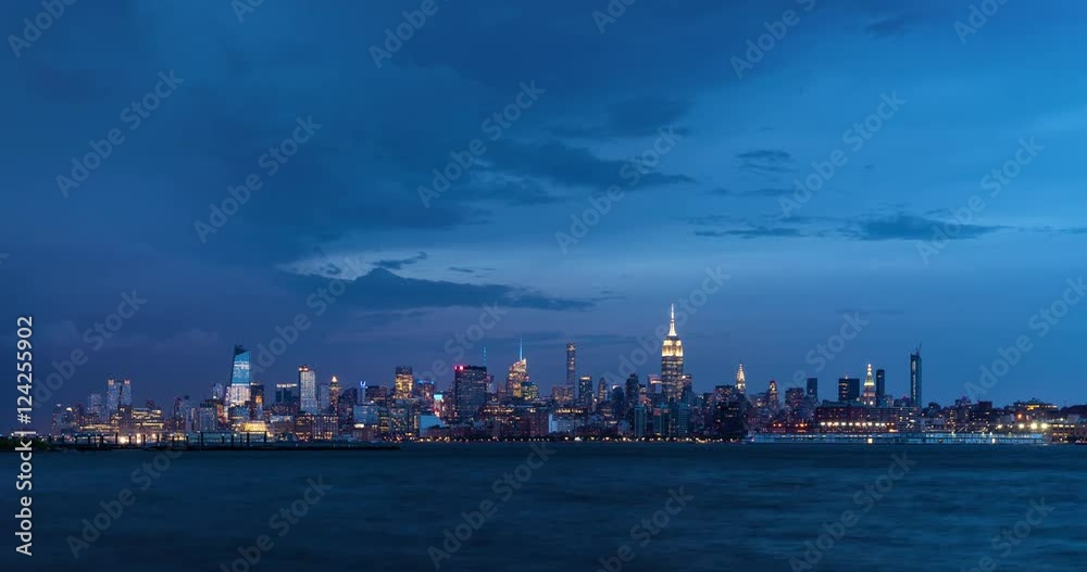 Cityscape time lapse of a summer evening storm and lightning in New York City. View of Manhattan Midtown West skyscrapers, West Village and Hudson River Cityscape time lapse of a summer evening storm and lightning in New York City. View of Manhattan Midtown West skyscrapers, West Village and Hudson River