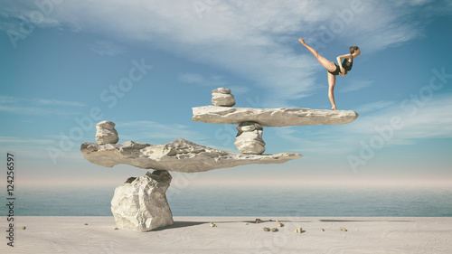 Young gymnast sitting on stones