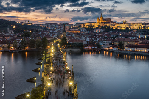 Prague, Czech Republic - 7 OCTOBER, 2016: Stunning view over Charles Bridge and Castle in Prague Czech Republic during sunset from above. © kapros76