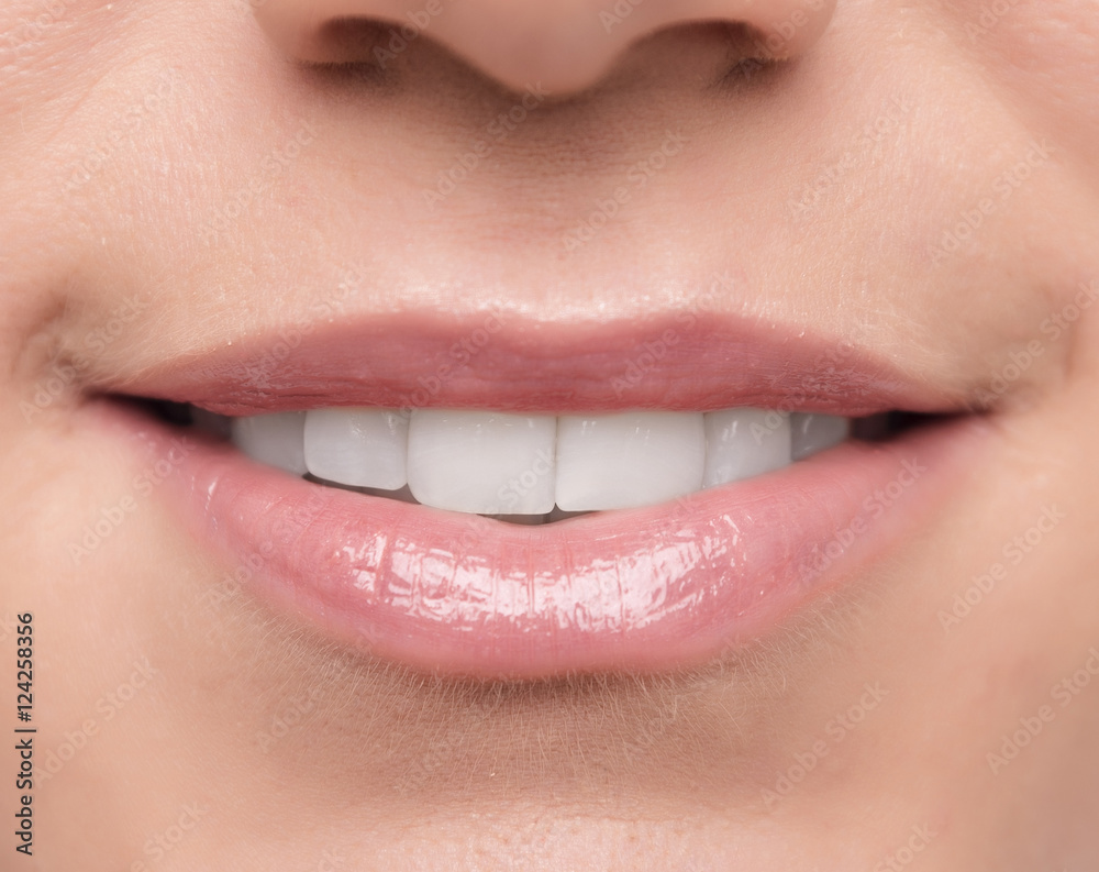 Fototapeta premium Beautiful wide smile of young woman.