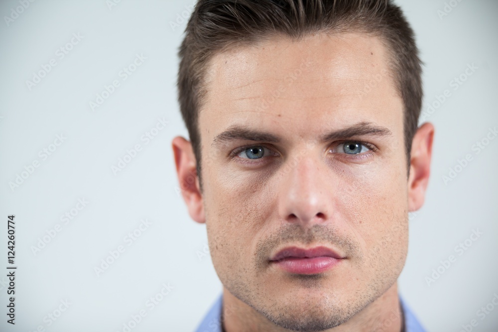 Man wearing contact lens Man wearing contact lens