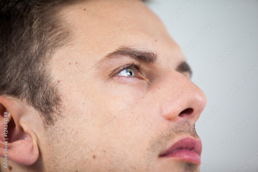 Close-up of man wearing contact lens Close-up of man wearing contact lens