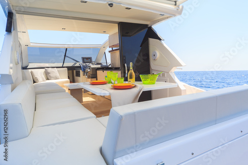 lunch on motor yacht, Table setting at a luxury yacht. © Andrea