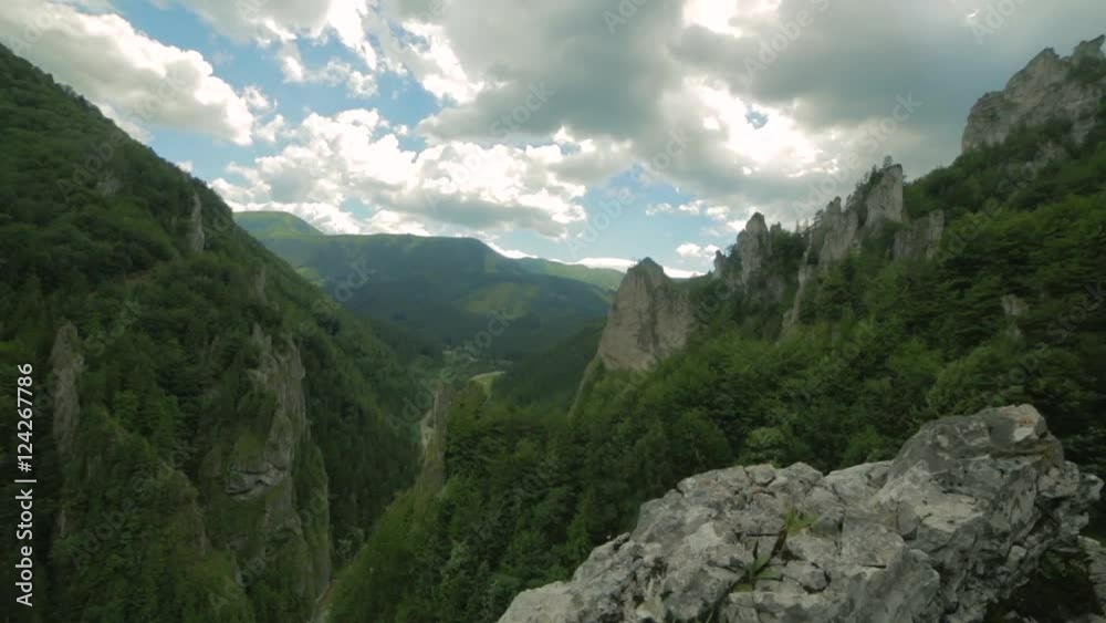 Aerial view of rocky hills with green coniferous trees Aerial view of rocky hills with green coniferous trees