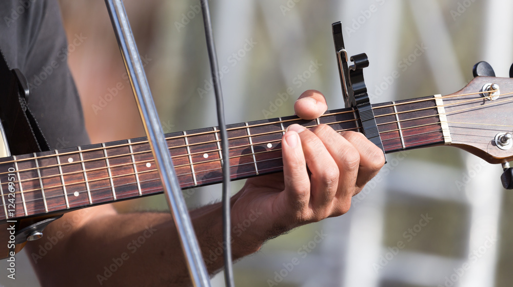 Fototapeta premium hand man playing the guitar