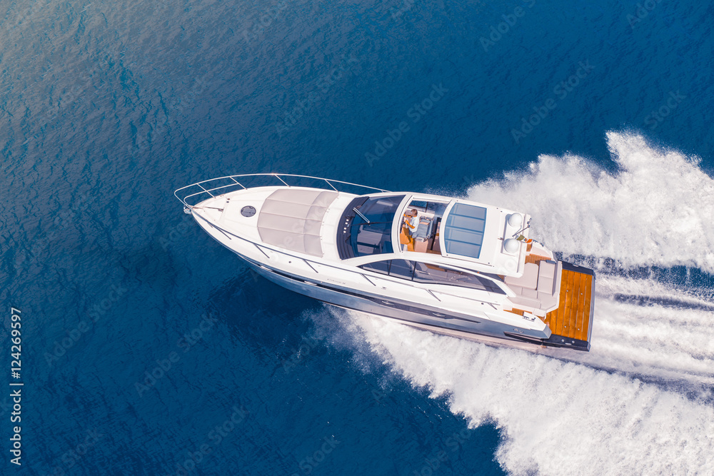 luxury motor boat, rio yachts italian shipyard, aerial view - obrazy, fototapety, plakaty 