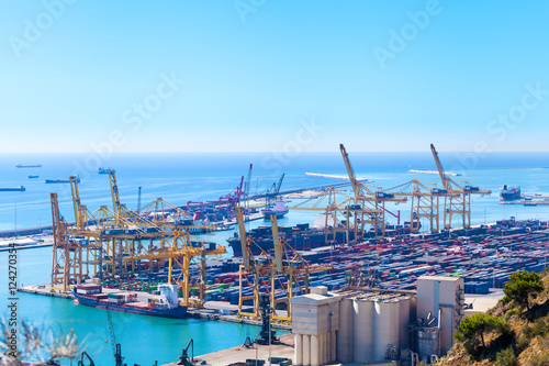 Panoramic view of the port in Barcelona, Spain. Cargo port with cars, containers and cargo ships.