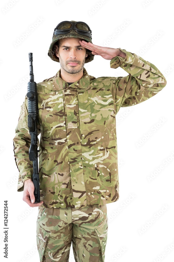 Portrait of soldier holding a rifle and saluting Portrait of soldier holding a rifle and saluting