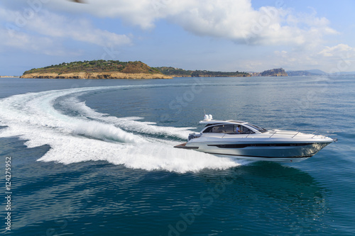 Obraz na płótnie luxury motor boat, rio yachts italian shipyard, aerial view w salonie
