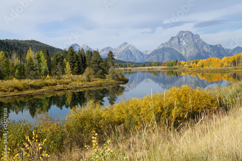 Mount Moran reflects in the water of the Snake River