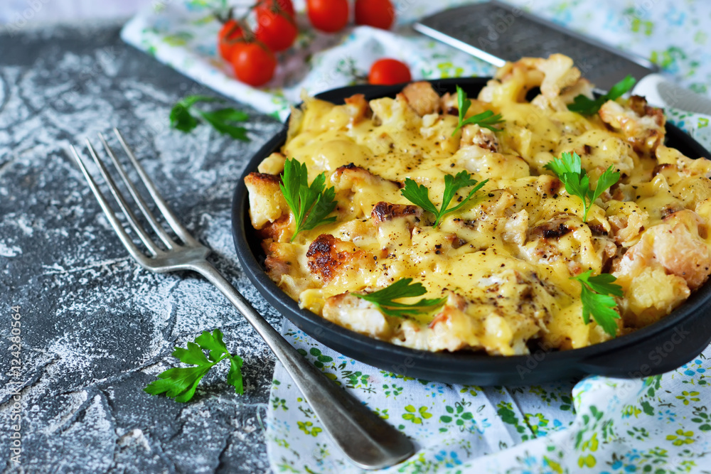 Frittata with cauliflower and mozzarella on a concrete backgroun Frittata with cauliflower and mozzarella on a concrete backgroun