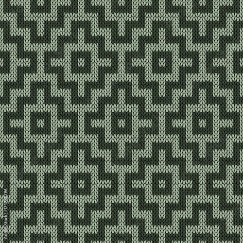 Knitting geometrical seamless pattern in muted colors