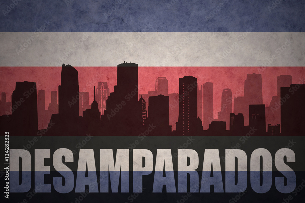 abstract silhouette of the city with text Desamparados at the vintage costa rican flag