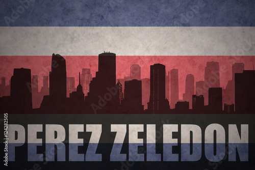 abstract silhouette of the city with text Perez Zeledon at the vintage costa rican flag photo