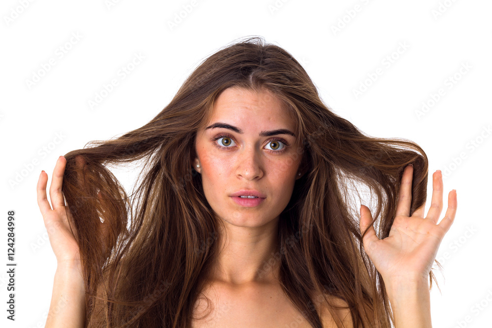 Naklejka premium Woman touching her tangled hair