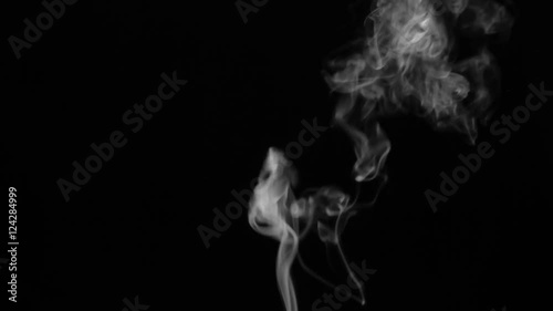 White smoke on black background