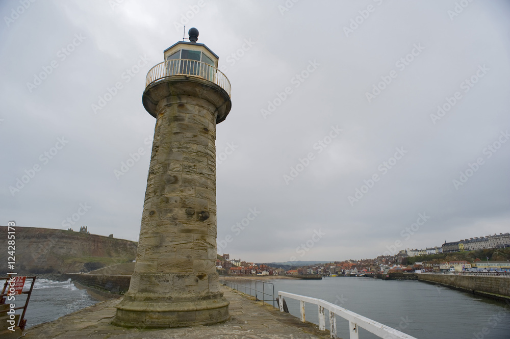 Stone avigation lighthouse in the pier of Whitby