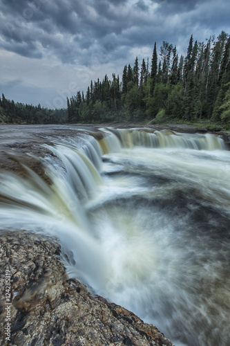 The Trout River flows over Sambaa Deh Falls in Sambaa Deh Territorial Park; Northwest Territories, Canada photo