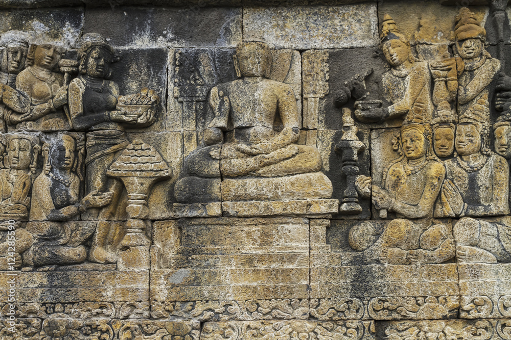 Bas-relief depicting the life of Buddha on a gallery of Candi Borubudur, Borobudur Temple Compounds, Central Java, Indonesia Bas-relief depicting the life of Buddha on a gallery of Candi Borubudur, Borobudur Temple Compounds, Central Java, Indonesia