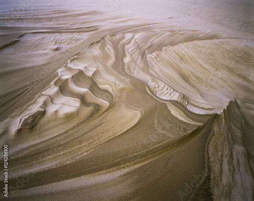 Erosion reveals layers of sand; Lakeside, Oregon, United States of America