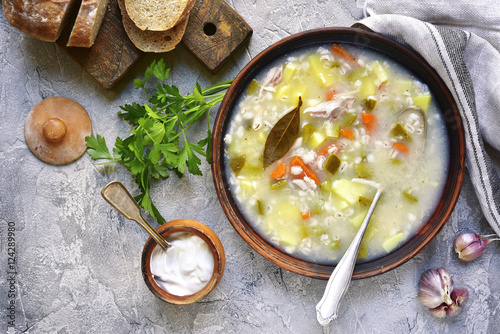 Rassolnik - traditional russian soup with pickled cucumber and c