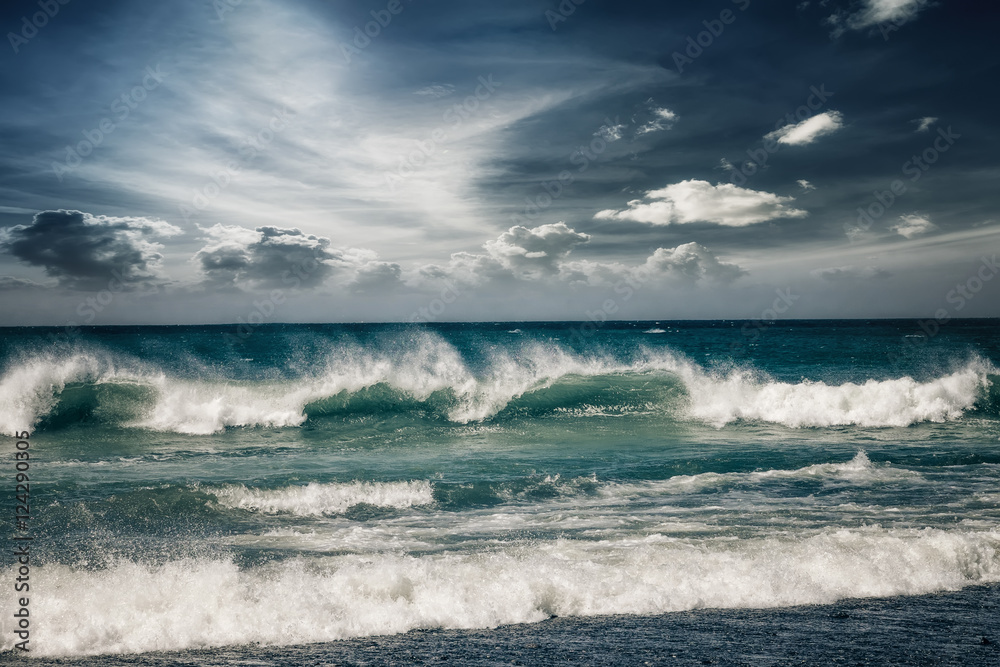 Stormy ocean landscape with rainy clouds