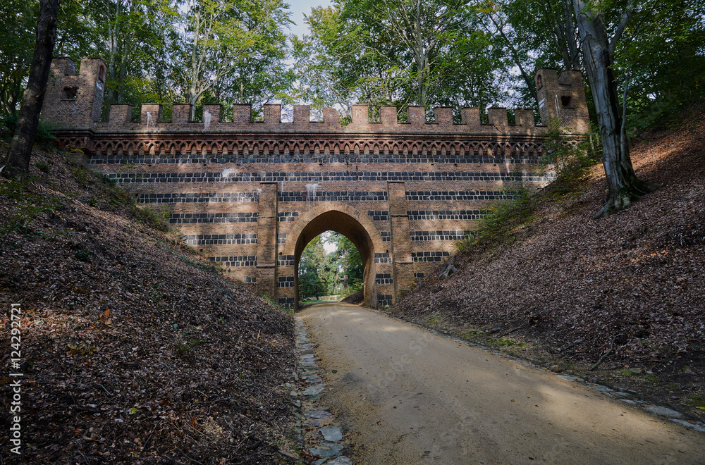 Stone viaduct in the park Muskauer in Poland.