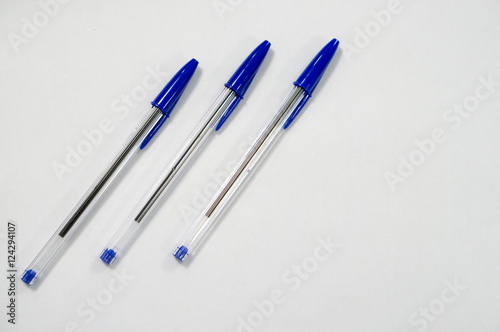 blue pen on white background