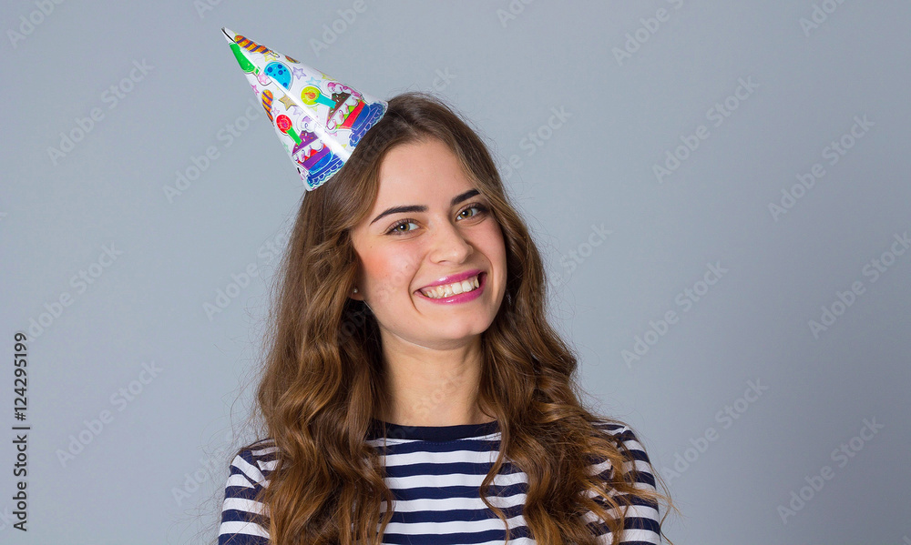 Smiling woman in celebration cap Smiling woman in celebration cap
