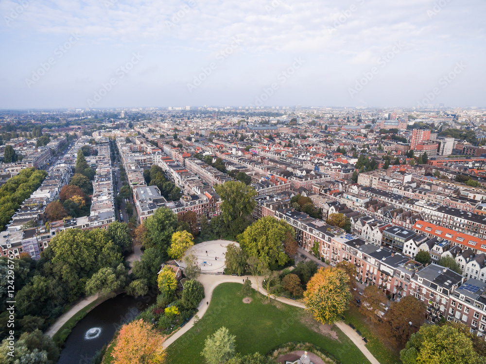 Aerial view of Amsterdam city roofs beside Sarphati park 
