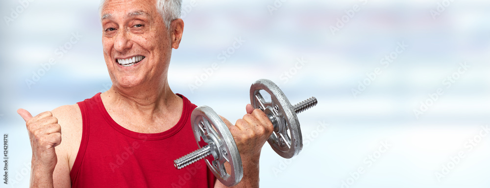 Naklejka premium Senior man with dumbbell.