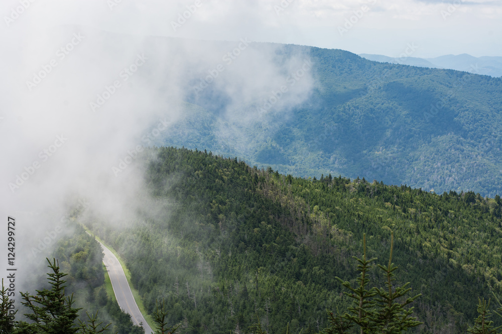 Blue Ridge Parkway.  Clouds hanging low over a mountain scene.  View from Mt. Mitchell.