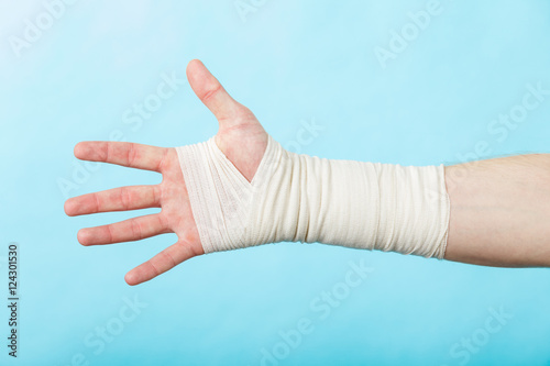 Obraz na płótnie Male hand in bandage.