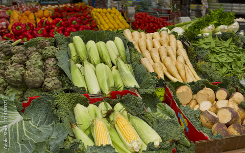 Vegetable shop with artichoke, parsnips, corns, and other vegetables