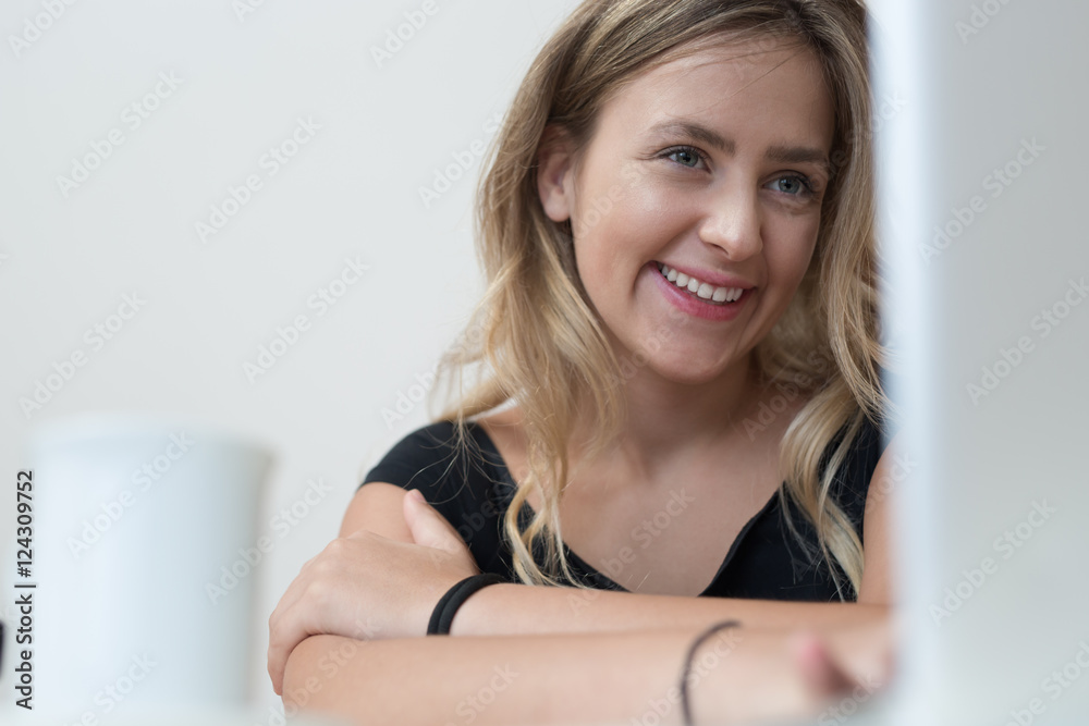 Young beautiful woman using a laptop computer Young beautiful woman using a laptop computer