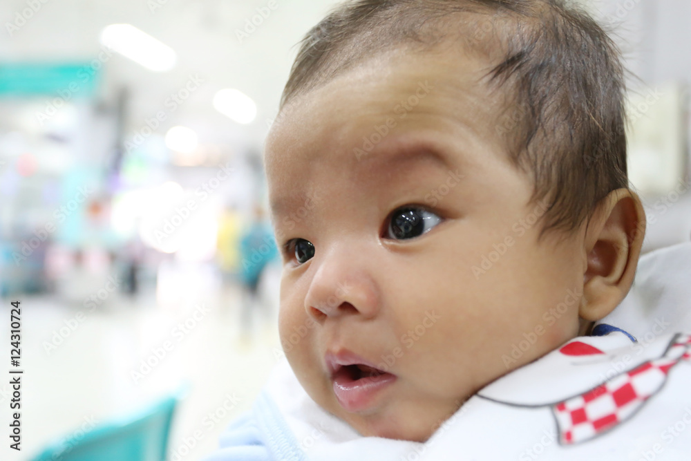 Asian baby in face a suspicion are development of Learning.