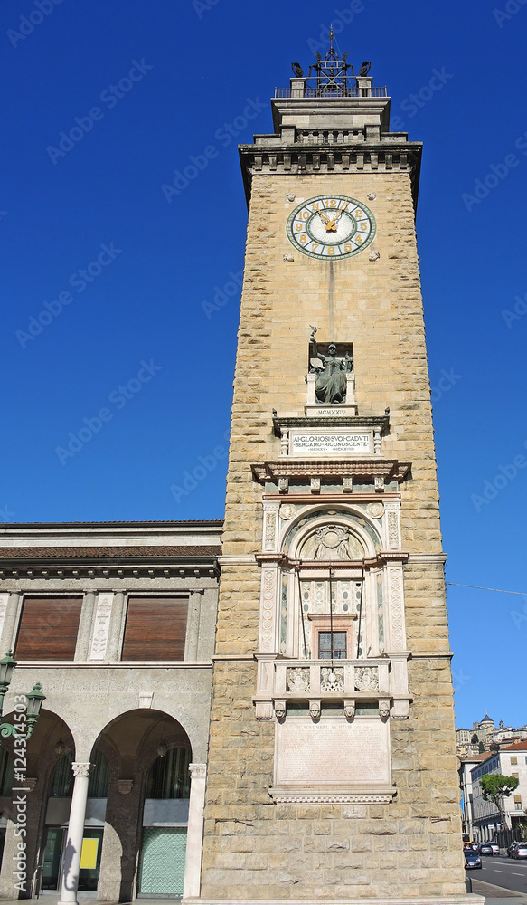 Bergamo, Lombardy, Italy. One of the beautiful city in Italy. The memorial tower in the city center, downtown. Located in Vittorio Veneto place, at the begin of the pedestrian boulevard.