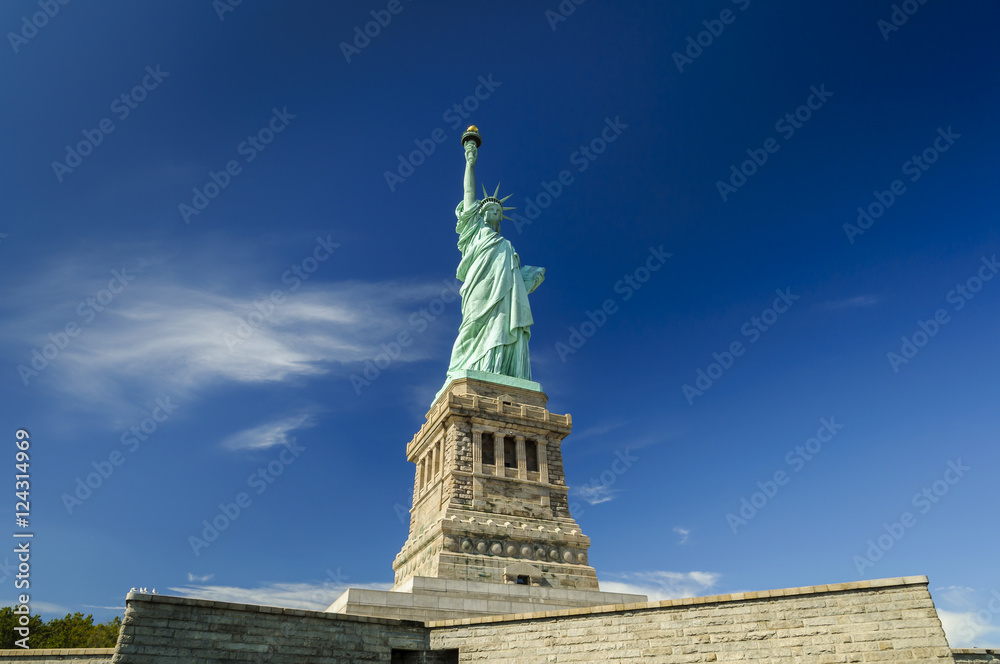 Fototapeta premium Statue of Liberty on Liberty Island on a sunny day, HDR, New York City, USA