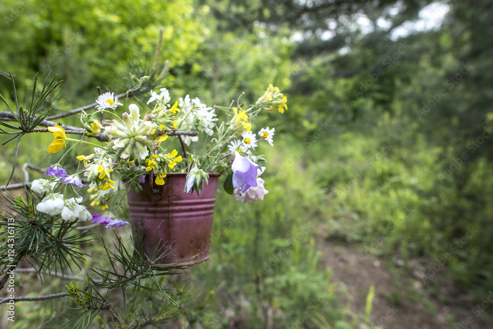 Bucket with wildflowers