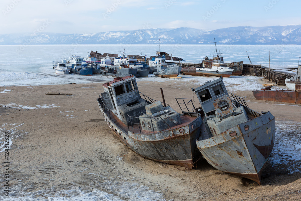 Old frozen ship on the bank of Olkhon island on siberian lake Ba