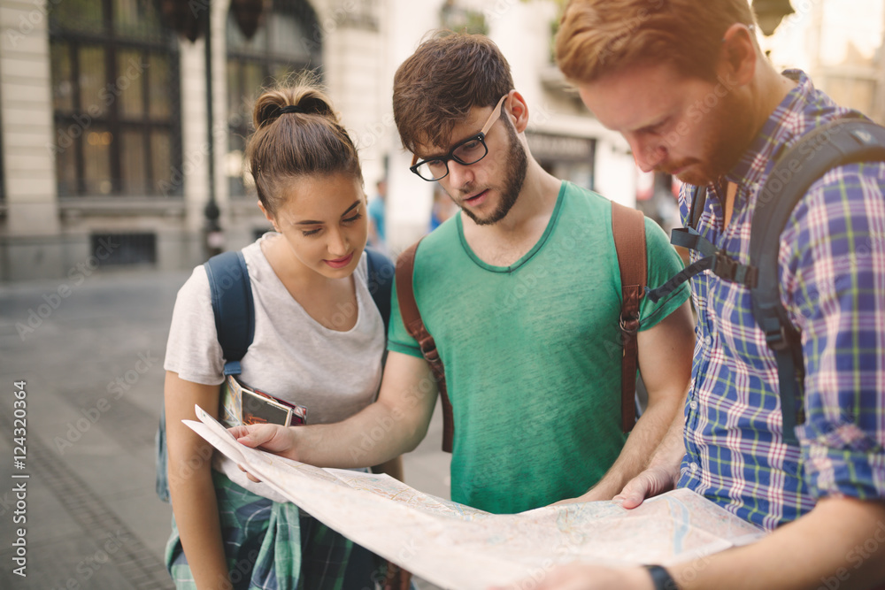 Happy tourists exploring city