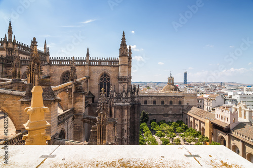 Sunny view of inner garden of Cathedral from viewpoint of Giralda in Sevilla, Andalusia province, Spain.