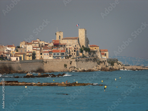Antibes city in French Riviera under the overcast  grey sky