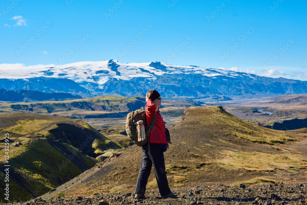 woman hiker on the trail, hiking in Iceland