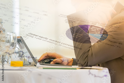 Financial and Investment concept. Double exposure of business man working with laptop computer and  Investment information chart.