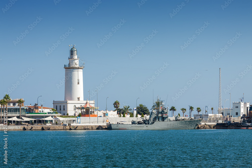 Sea lighthouse at marine of port of Malaga, Andalusia province, Spain.