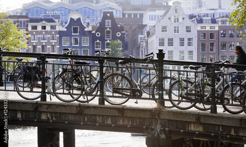Bicycles attached to a bridge in Amsterdam