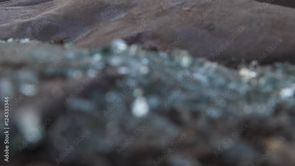 Shattered glass, rack focus close up of shattered glass on city street, Brooklyn, New York. Shattered glass, rack focus close up of shattered glass on city street, Brooklyn, New York.